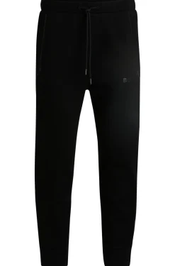 Jogginghose aus Baumwoll-Mix mit spiegelndem Logo