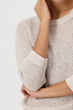 Strickpullover mit Schmuck