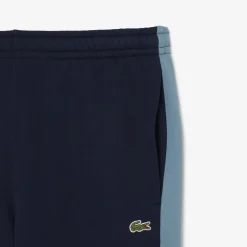 Trainingshose mit zulaufenden Beinen und Colorblock-Design